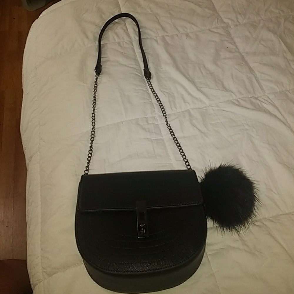 BCBG chain link strap with fur keychain puff